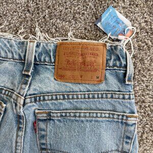 Vintage Womens Levi Jeans 550 Relaxed Fit Tapered Ripped Light Wash Denim 9 JR M